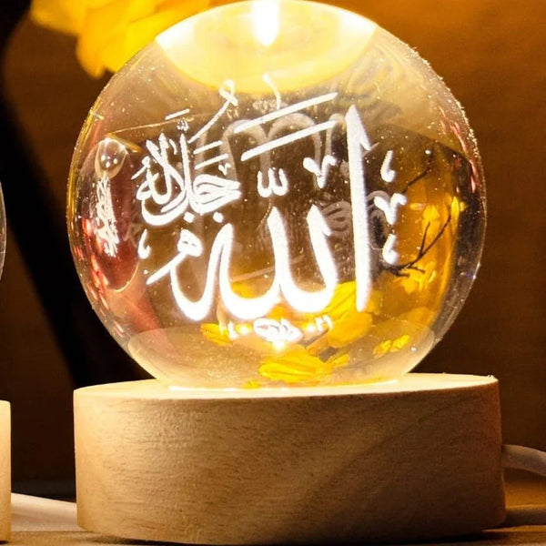 Elegant crystal ball Arabic night lamp with Islamic calligraphy on wooden base, warm light