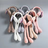 Plush rabbit ear hats with long moving ears in brown, white, grey, and pink for kids.