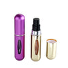 Refillable mini perfume spray bottles in purple and gold, portable travel atomizer design
