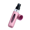 Pink refillable mini perfume spray bottle with transparent window and removable cap